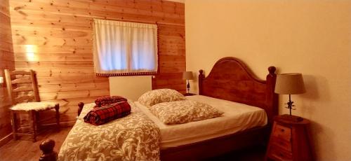 Cama o camas de una habitación en Ecogite Mercantour Le Pacha