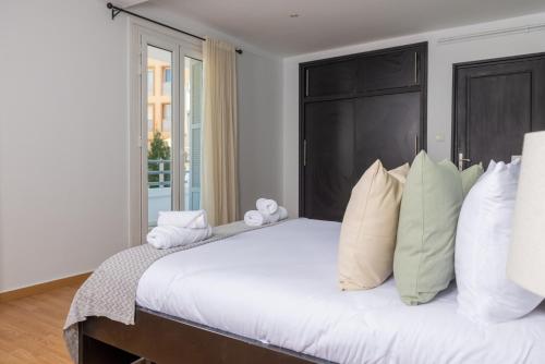 Cama o camas de una habitación en Nouvel Appartement à Hydra