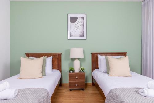 Cama o camas de una habitación en Nouvel Appartement à Hydra