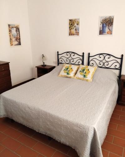 Postel nebo postele na pokoji v ubytování Agriturismo La Burraia vicino a San Gimignano-Air conditioning-EV wallbox