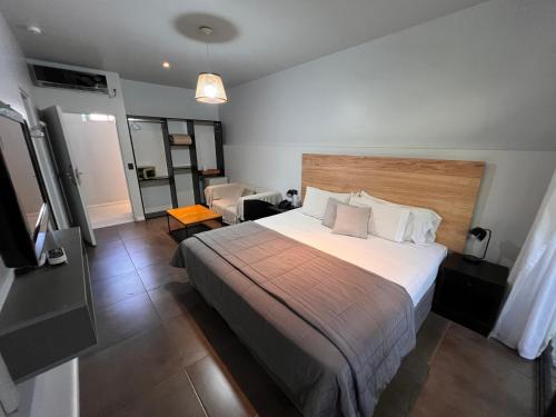 a bedroom with a large bed in a room at 5411 Soho Hotel in Buenos Aires