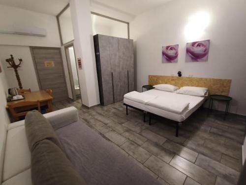 Letto o letti in una camera di Airport Boulevard Guesthouse