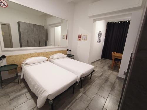 Letto o letti in una camera di Airport Boulevard Guesthouse