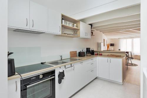 Køkken eller tekøkken på La Galerie Pornic - Maison Cedre