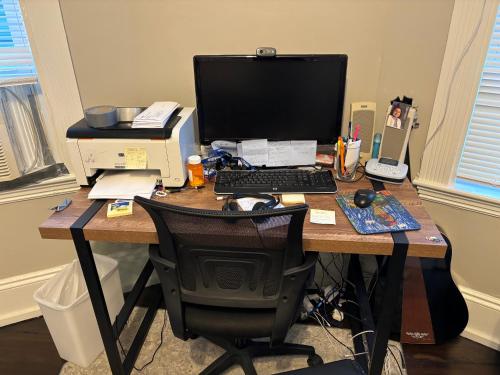 a desk with a computer and a printer on it at HomeStay in Boston - Dorchester Fields Corner Area in Boston