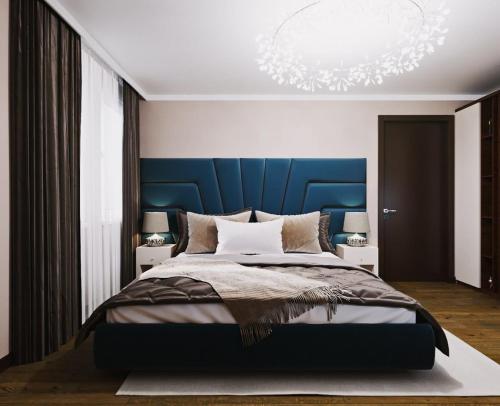 Llit o llits en una habitació de Glamour Apartment