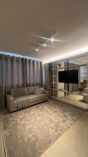 Χώρος καθιστικού στο Flat in Sapucaia do Sul