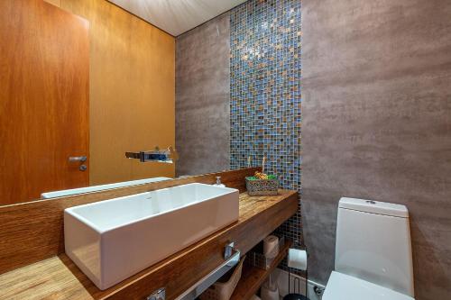 Ένα μπάνιο στο Pertinho da Catedral - stayhousetemporada