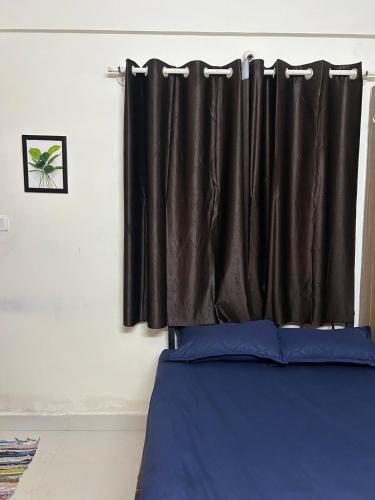 Postel nebo postele na pokoji v ubytování Compact one room flat in Whitefield - Mini, Basic