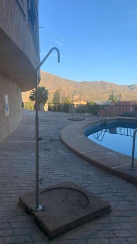 Bazén v ubytování Ático en La Envía con estupendas vistas y tranquilidad nebo v jeho okolí