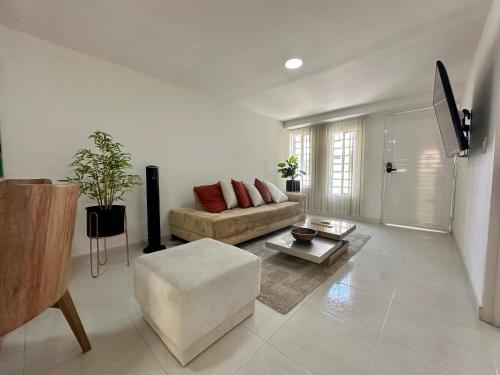 Μια τηλεόραση ή/και κέντρο ψυχαγωγίας στο Acogedora casa en zona tranquila