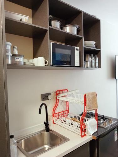 Una cocina o cocineta en Nanic Homes Aries Studio