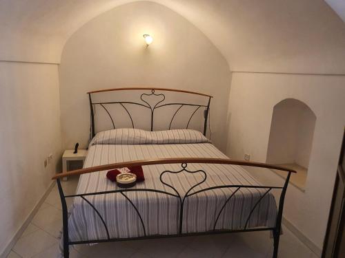 Postel nebo postele na pokoji v ubytování La Dimora del Conte By il Nido Di Edera