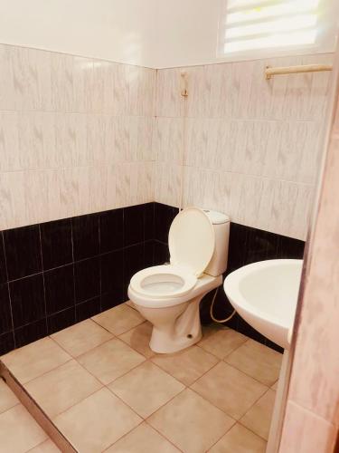 Un baño de Vilu Residence