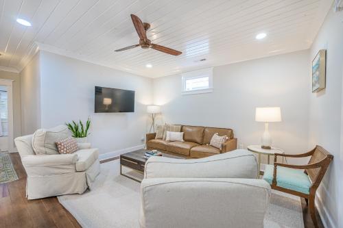 a living room with two couches and a ceiling fan at The Bogard Only 4 Blocks to King in Charleston