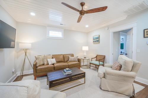 a living room with couches and a ceiling fan at The Bogard Only 4 Blocks to King in Charleston