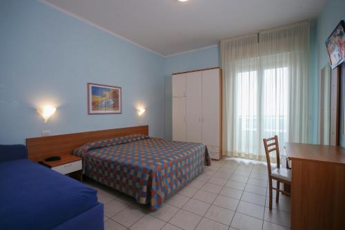Cama o camas de una habitación en Hotel Iones