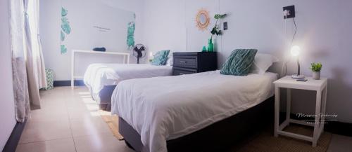 Ένα ή περισσότερα κρεβάτια σε δωμάτιο στο Desert Place Self-catering cc
