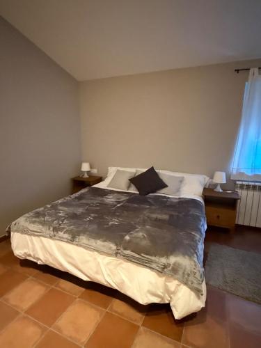 Postel nebo postele na pokoji v ubytování Can Ricart
