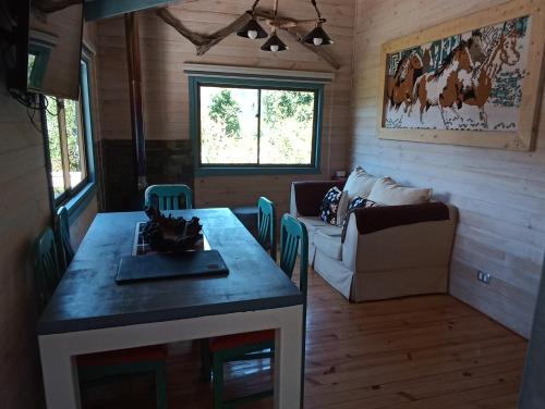 Χώρος καθιστικού στο Cabaña Osanvile