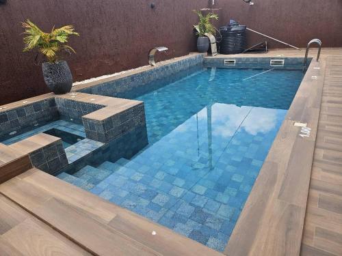 Baseinas apgyvendinimo įstaigoje Villa OASIS arba netoliese