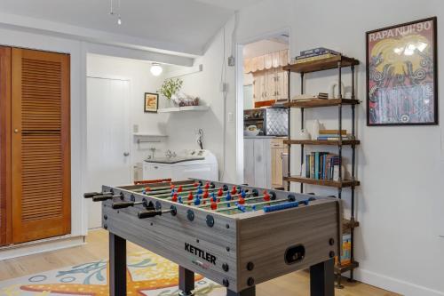 a large foosball table in a room at California Dreamin by AvantStay Private Pool Fire Pit Near the Beach in Carlsbad