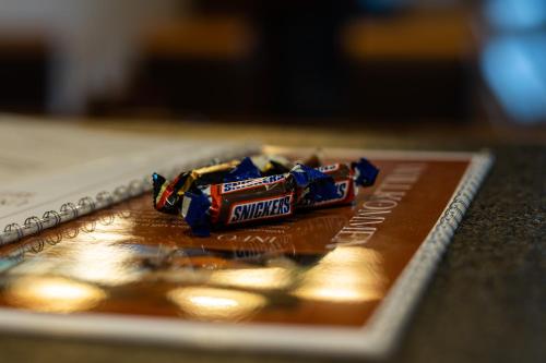 a group of candy wrappers sitting on a table at Alpenblick Loft neben Skilift in Amden Arvenbüel in Amden
