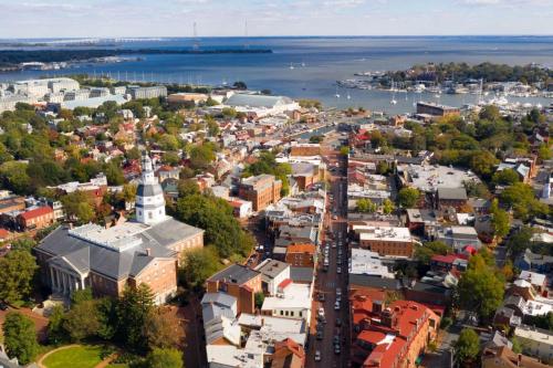 an aerial view of a city with a harbor at Cool Spring Suite in Arnold