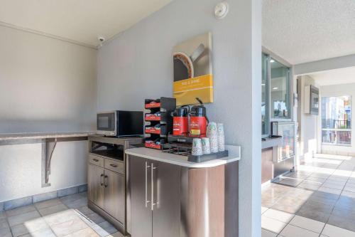 a kitchen with a counter with a box on the wall at Motel 6 Hayward, CA- Silicon Valley Gateway in Hayward