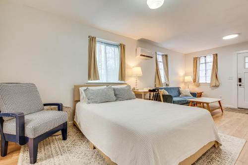 a bedroom with a bed and a chair at Studio Apartment Near East Atlanta Village in Atlanta