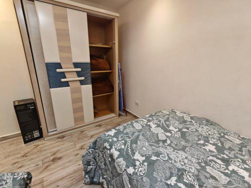 Roxy Square Apartmentにあるベッド