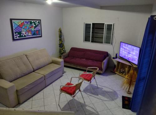 Χώρος καθιστικού στο Hostel da terê