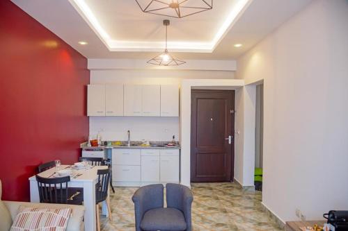 Η κουζίνα ή μικρή κουζίνα στο Douala-Bonapriso, Bel Appartement