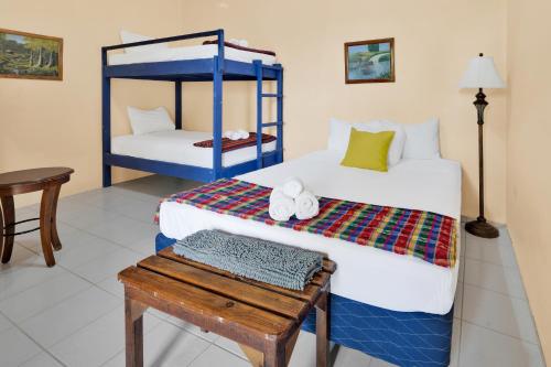 Un ou plusieurs lits dans un hébergement de l'établissement Drift Inn Cayo