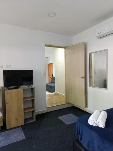 Postel nebo postele na pokoji v ubytování Apartahotel Provenza