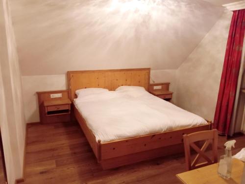 Postel nebo postele na pokoji v ubytování Eichen Schlössl