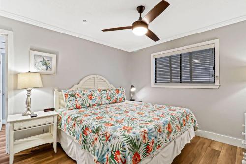 Ένα ή περισσότερα κρεβάτια σε δωμάτιο στο Carolina Beach Club 525