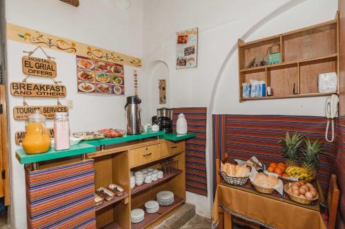 Kuchyň nebo kuchyňský kout v ubytování Hostal El Grial