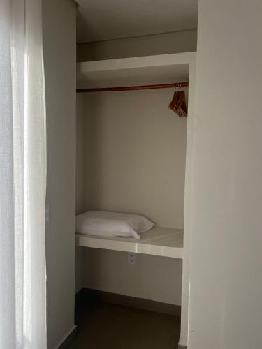 a small closet with a bed in a room at Sunny Kite House Prea in Prea