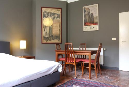 Ένα ή περισσότερα κρεβάτια σε δωμάτιο στο Baeten's bed and breakfast