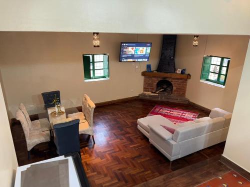 TV a/nebo společenská místnost v ubytování Acogedor Departamento en Barrio Resbalosa, a 5 Min de la Plaza de Cusco