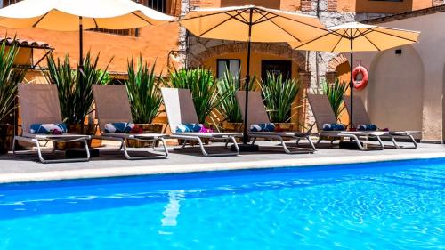 Bazén v ubytování Hotel Chocolate Carruaje nebo v jeho okolí