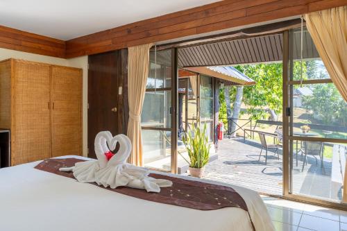 Postel nebo postele na pokoji v ubytování Pung-Waan Resort
