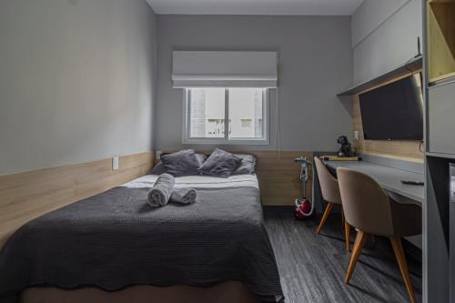 Katil atau katil-katil dalam bilik di Aconchegante flat próximo a GM