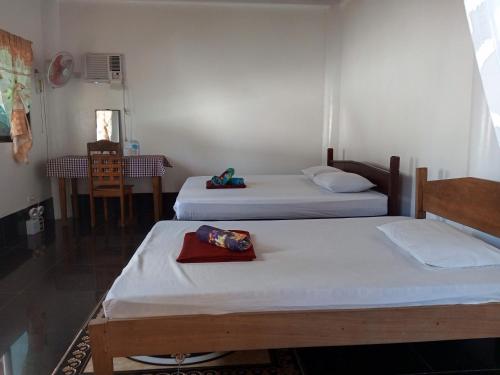 Katil atau katil-katil dalam bilik di Nine Clouds Homestyle Accommodation