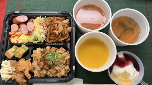 a black tray of food with different foods and drinks at Toyoko Inn Hiroshima-eki Minami-guchi Migi in Hiroshima