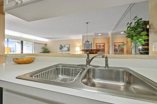 a kitchen with a stainless steel sink in a kitchen at Innisbrook Copperhead Course-15th Hole in Palm Harbor