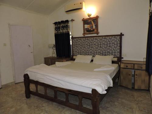 Postel nebo postele na pokoji v ubytování Zappia Cove Resort Palolem