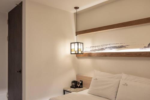 Katil atau katil-katil dalam bilik di From H Maru Hotel Pocheon