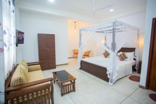 Cama o camas de una habitación en D2 Villa Unawatuna